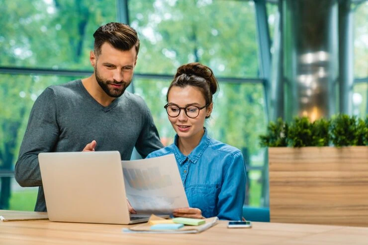 Specialist Reviewing Email Campaign Performance Metrics